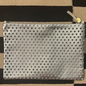 Clare V Silver Perforated Pouch with Tabs. NWT